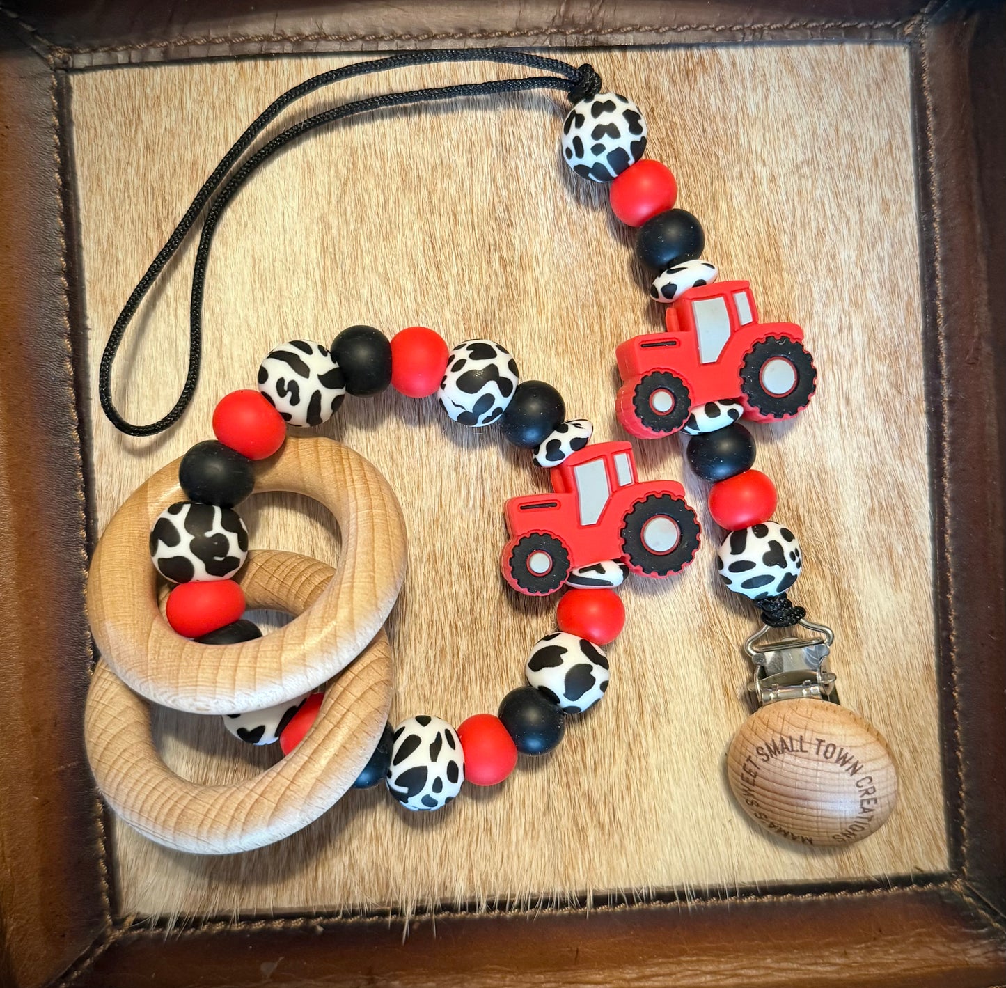 Red Tractor Cow Print Teether Set
