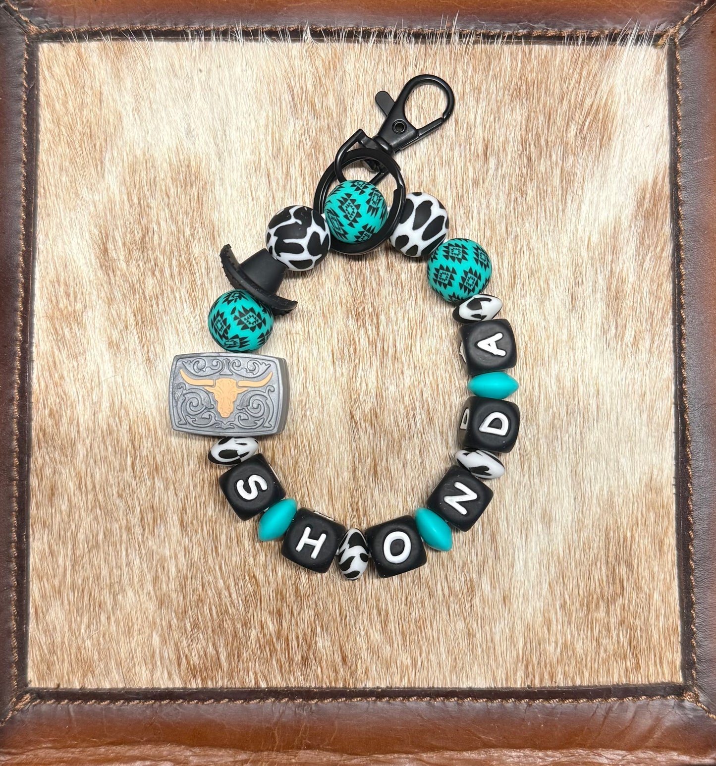 Turquoise Aztec Cowhide Custom Name Wristlet