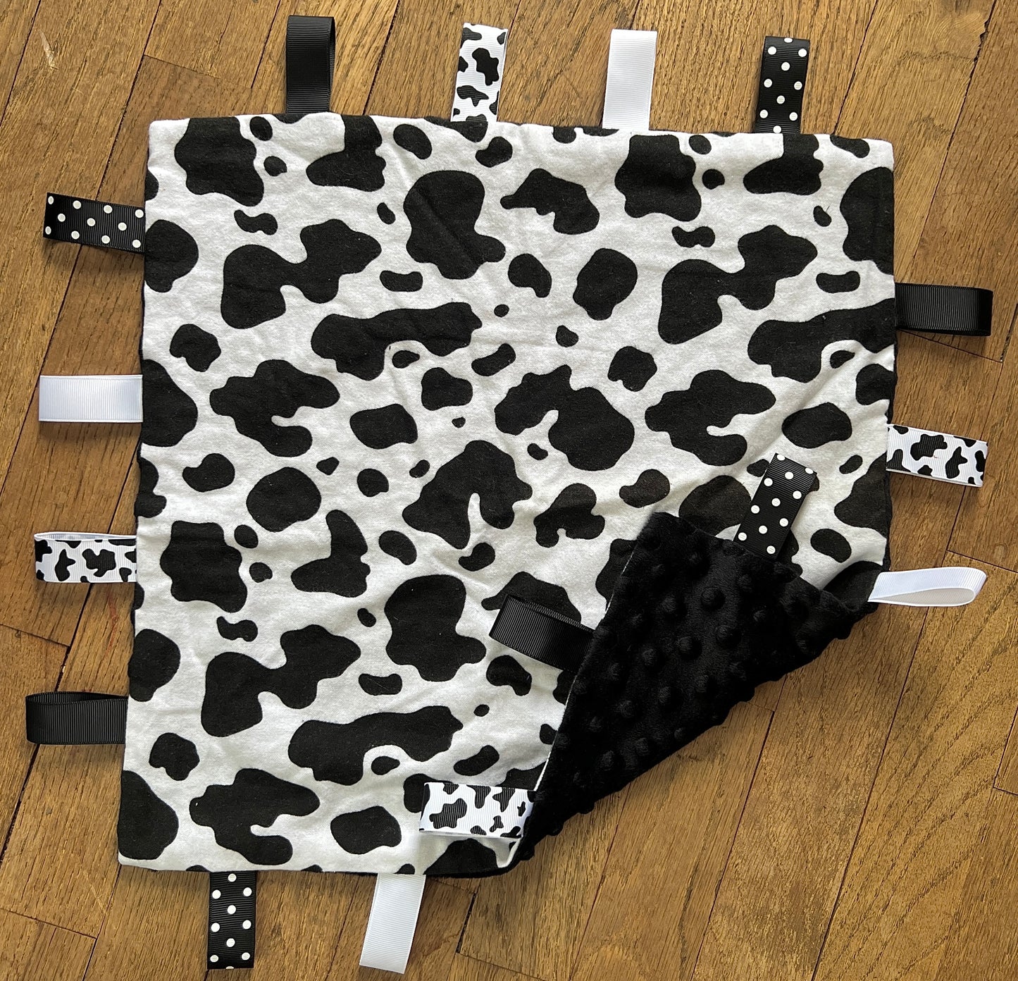 Cow Print Taggie Blanket with Black Backing