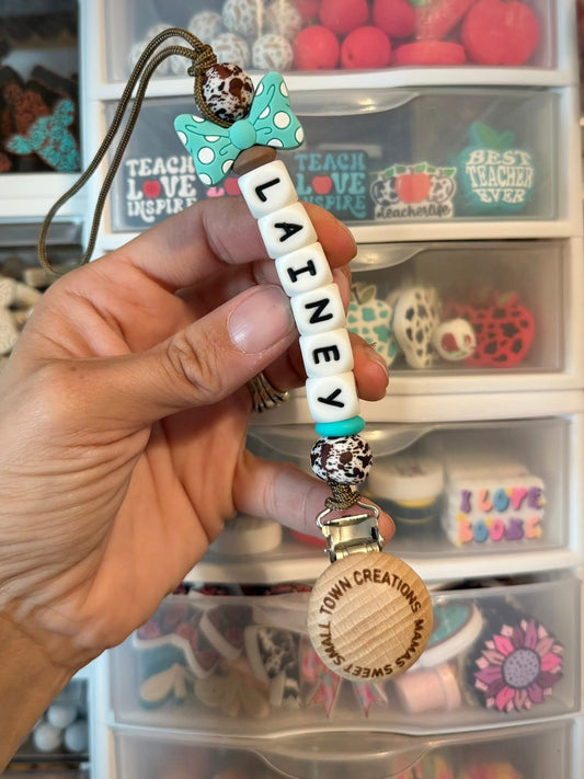Turquoise Bow Brown Cowhide pacifier Holder with Name