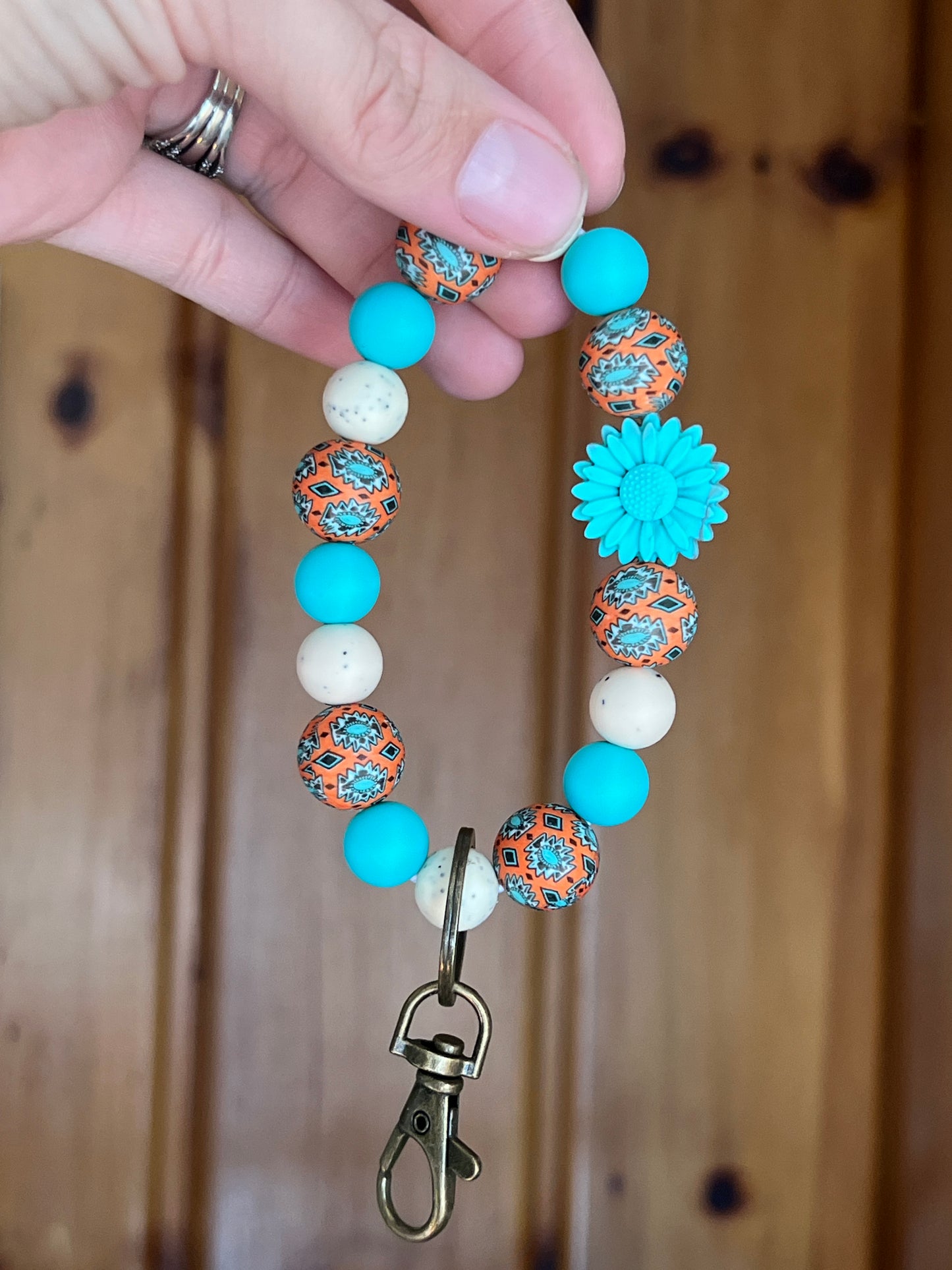 Rust/Turquoise Aztec Flower Wristlet