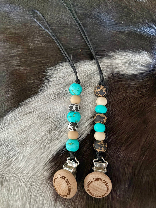 Turquoise and Cowhide Pacifier Holder