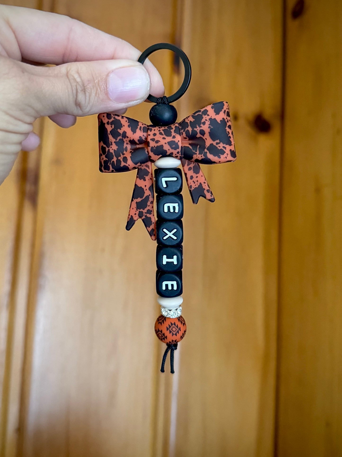 Custom Name Rust Cowhide Bow Keychain