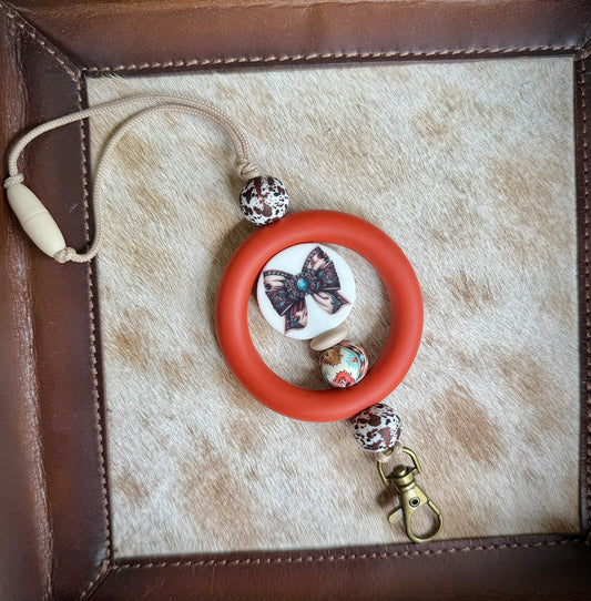 Western Bow Rust Aztec Car Dangle