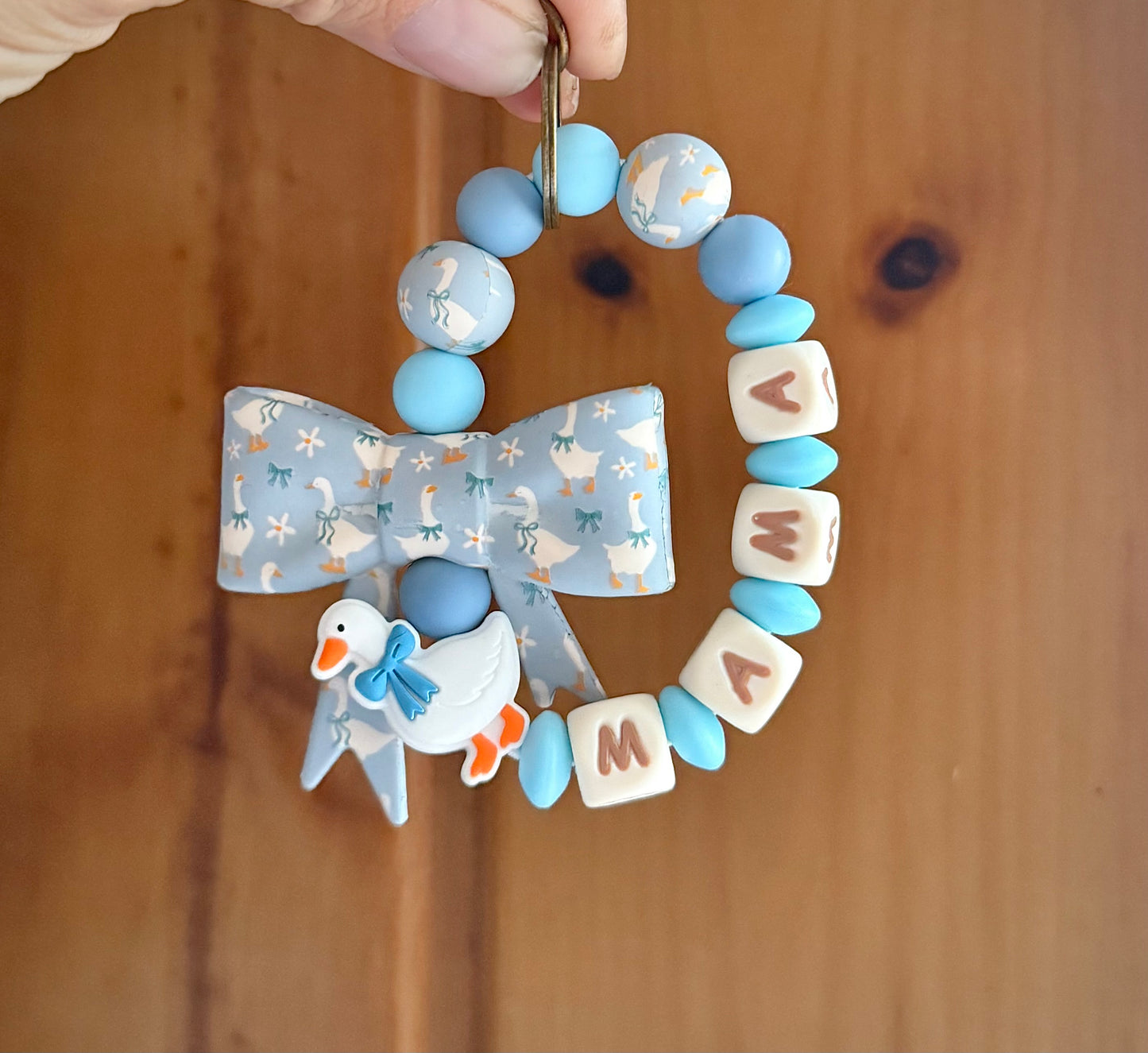 Silly Goose Bow Blue Mama Wristlet