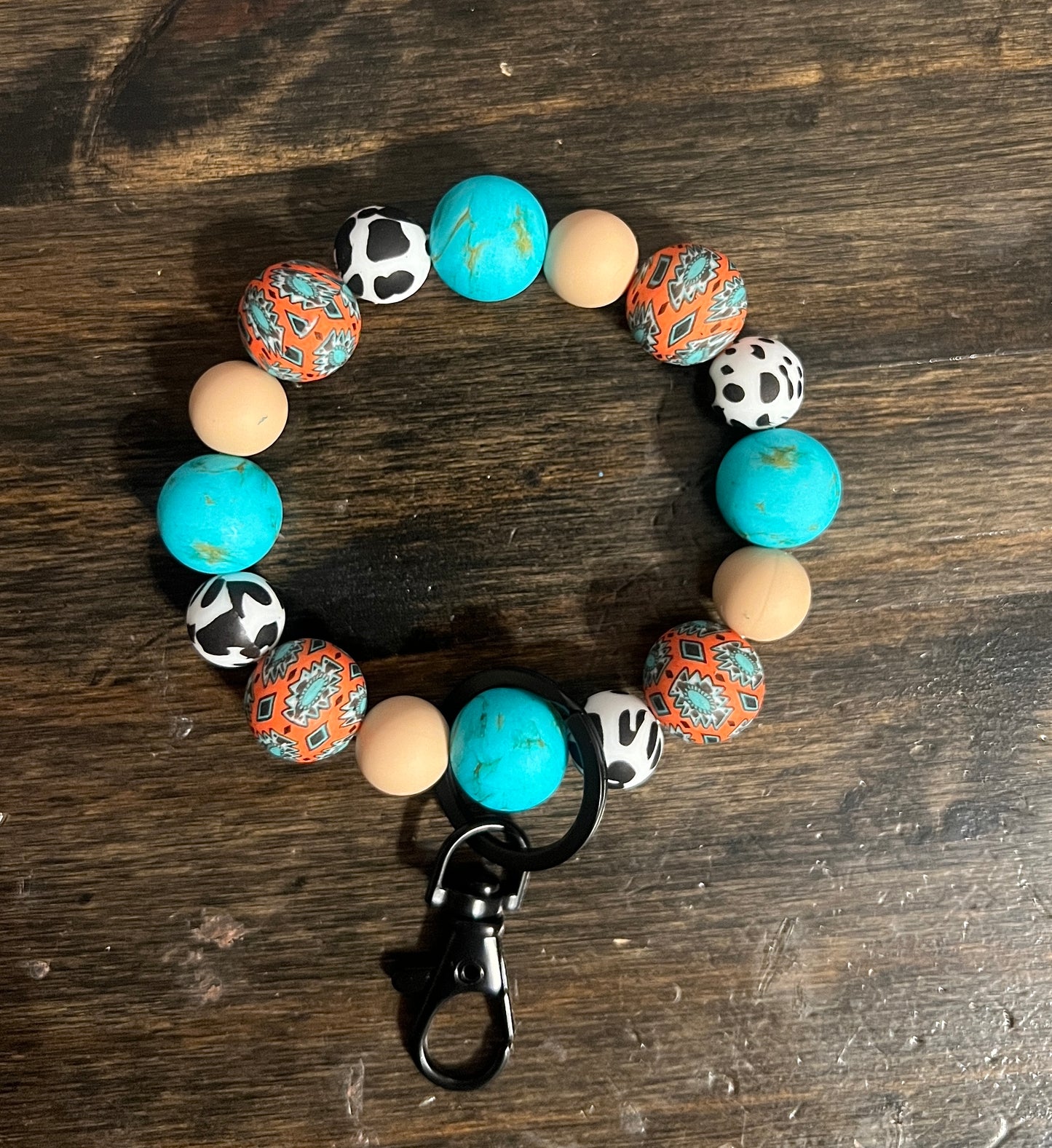 Rust Aztec Turquoise Stone Cow Print Wristlet