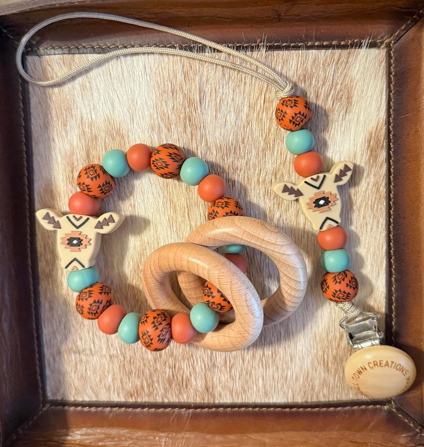 Rust / Dusty Teal Aztec Cow Teether Set