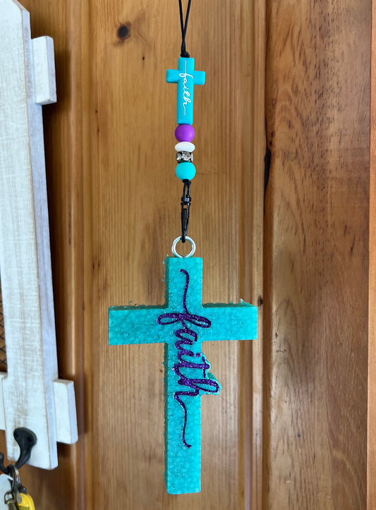 Turquoise Cross Purple Writing