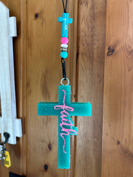 Turquoise Cross Pink Writing