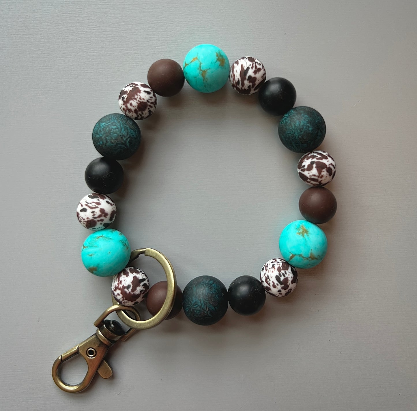 Turquoise Stone Brown Cow Wristlet