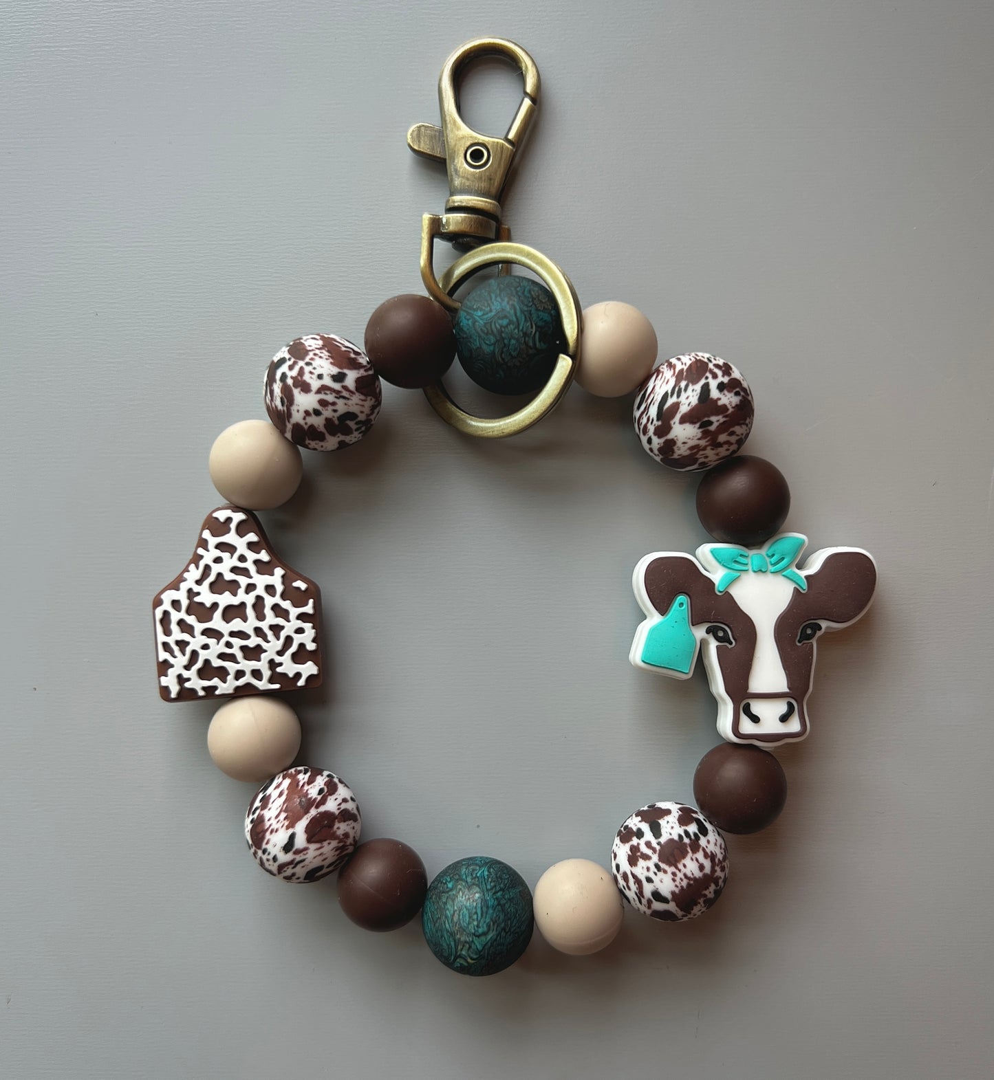 Turquoise Tooled Leather Brown Cow Wristlet