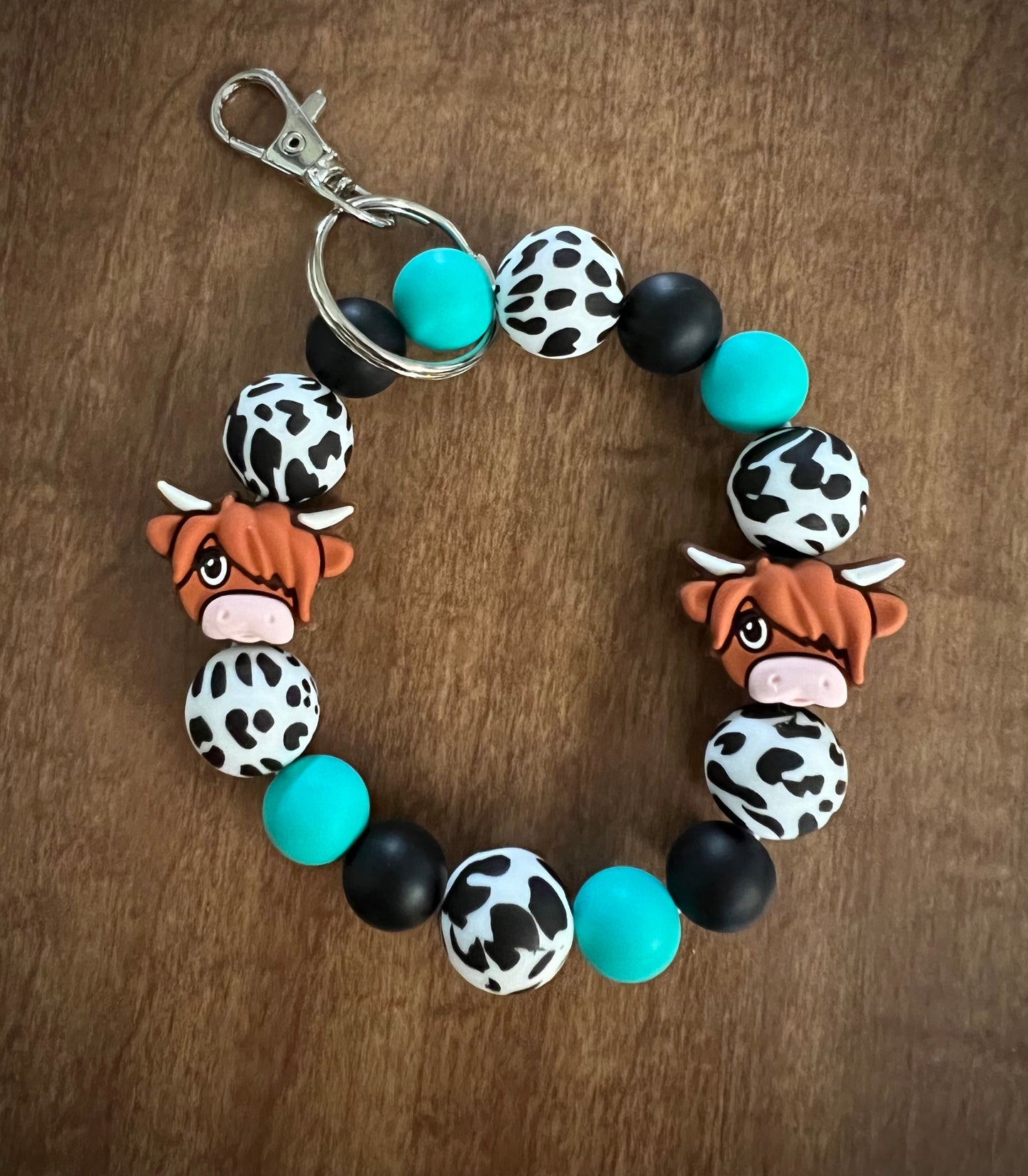 Highland B&W Cow Wristlet Turquoise