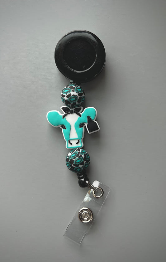 Western Turquoise Cow Badge Reel