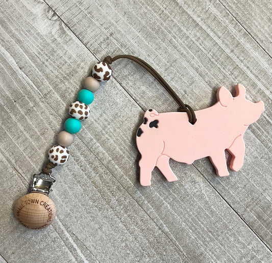 Pig Teether Turquoise and Brown Cow Print