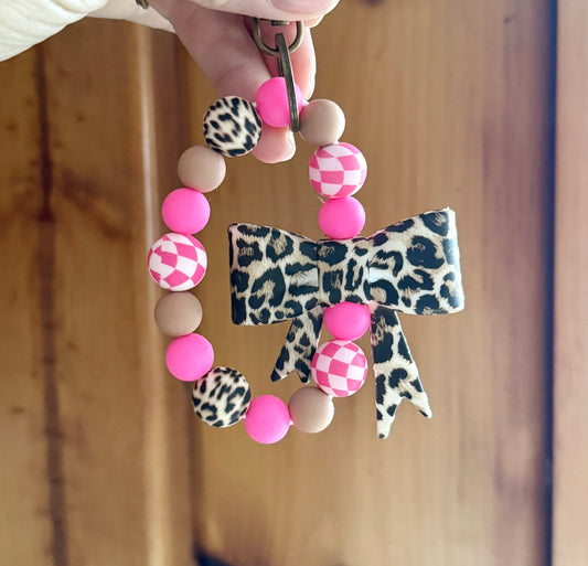 Cheetah Bow Pink Checkered Wristlet