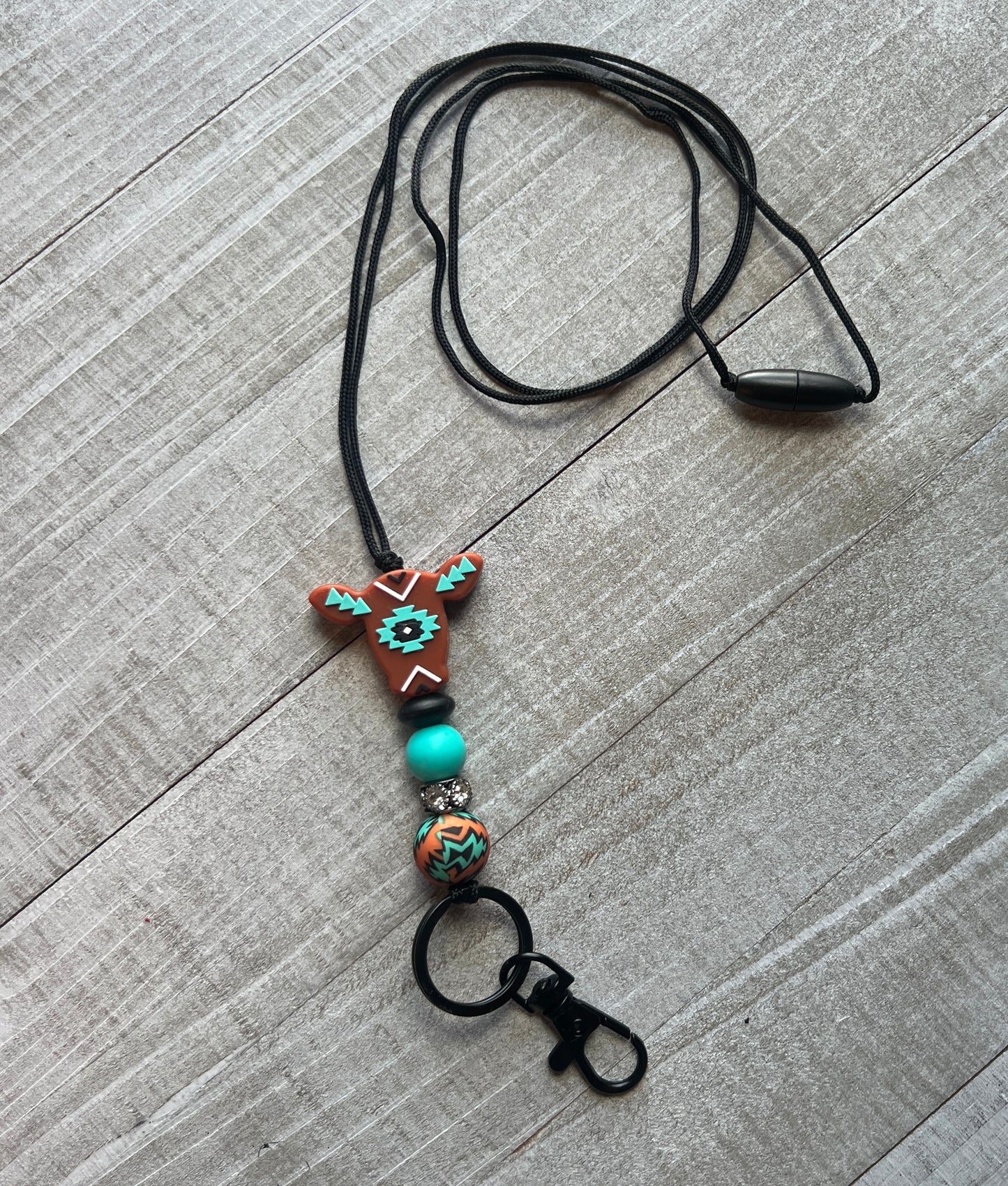 Turquoise and Rust Aztec Cow Lanyard