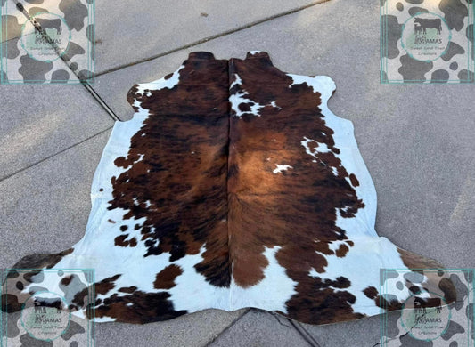 Brown and White Cowhide Rug