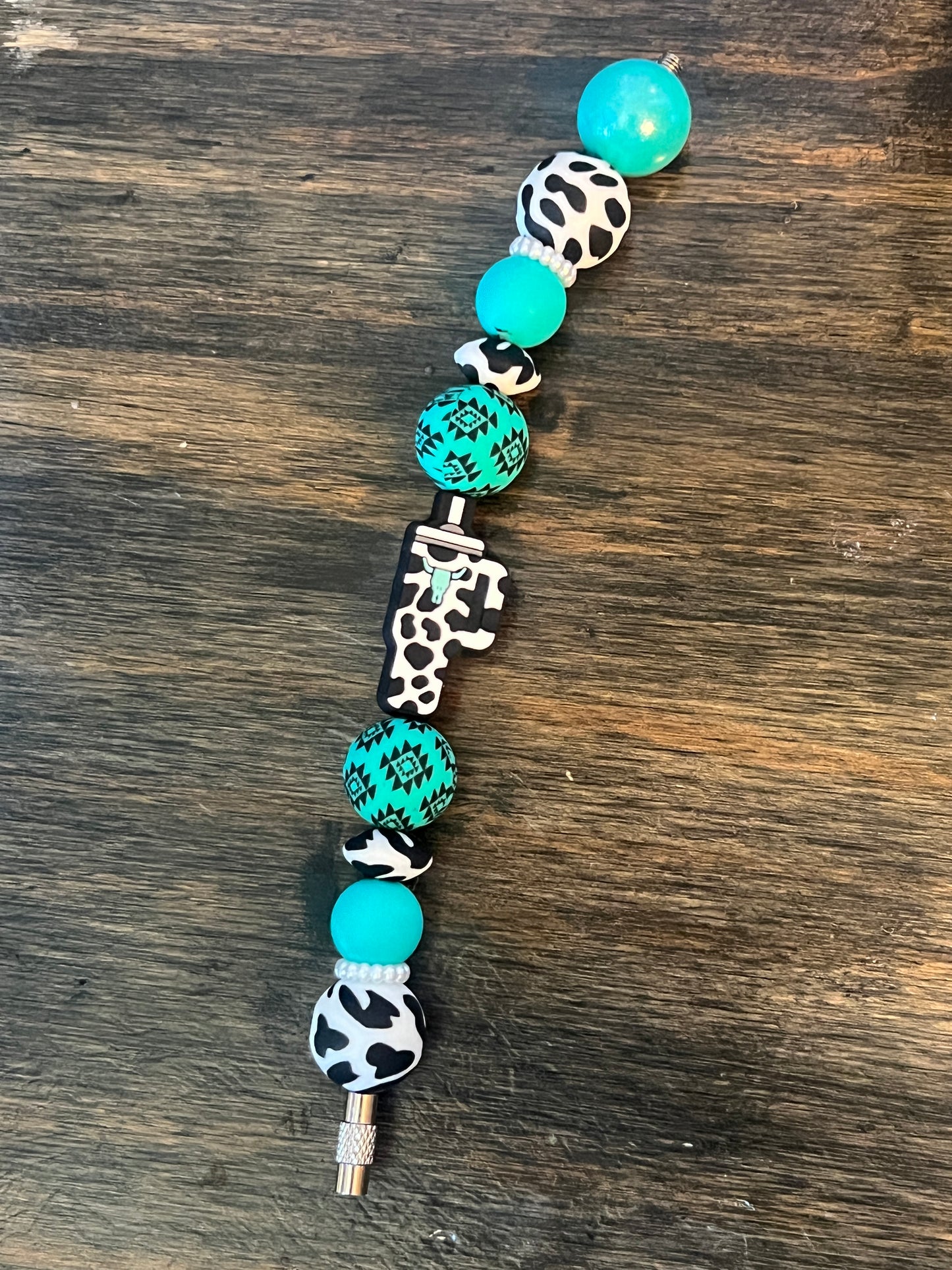 Turquoise Cow Print Cup Charm