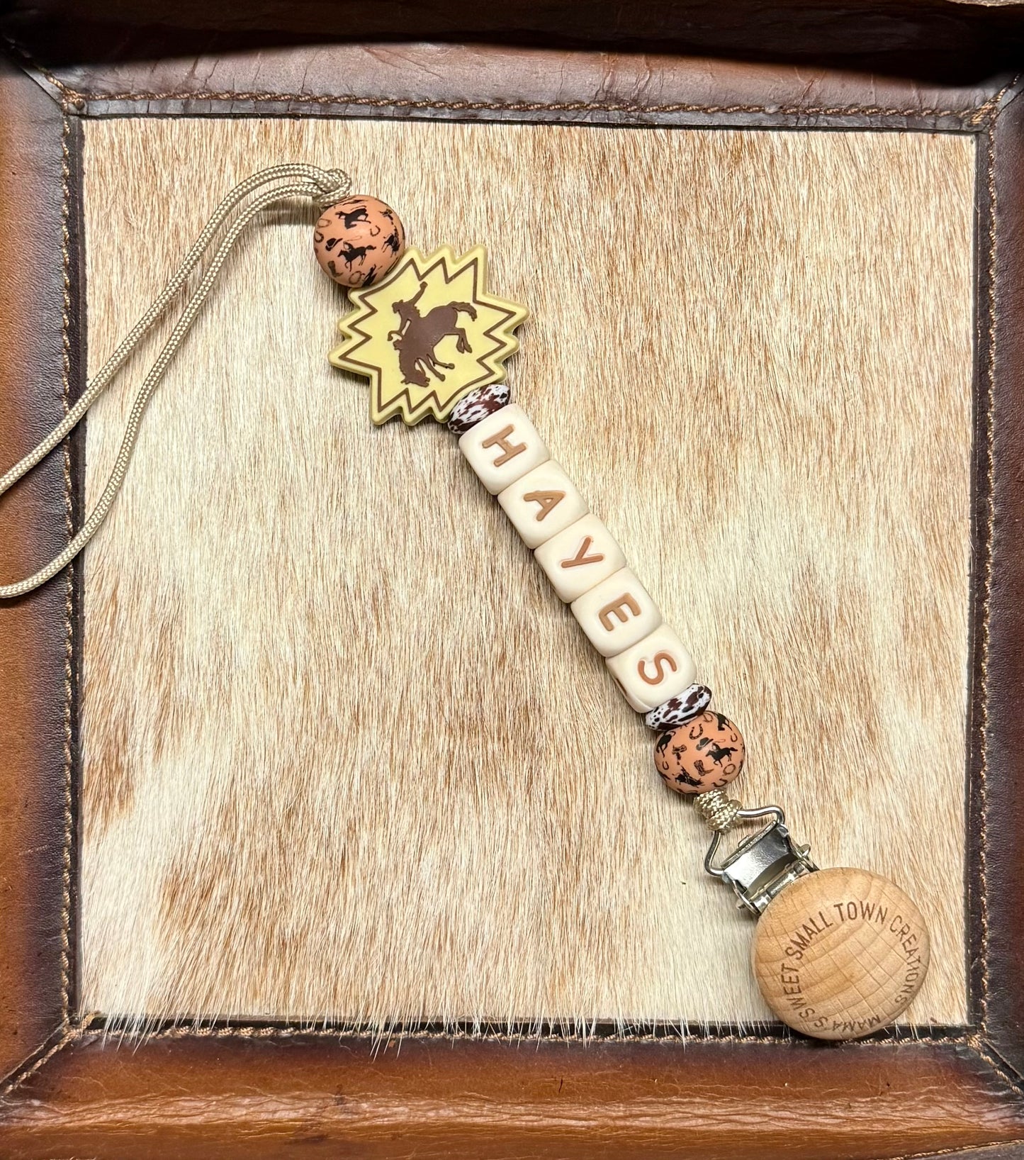 Bucking Horse Brown Cowhide With Custom Name Pacifier Holder
