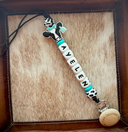 Turquoise Bandanna Black Cow Custom Name Pacifier Holder