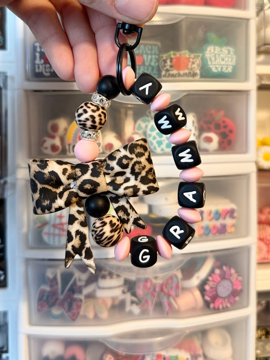Cheetah Bow Light Pink Name Wristlet