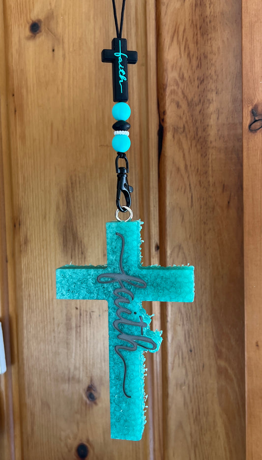 Turquoise Cross With Gray Writing