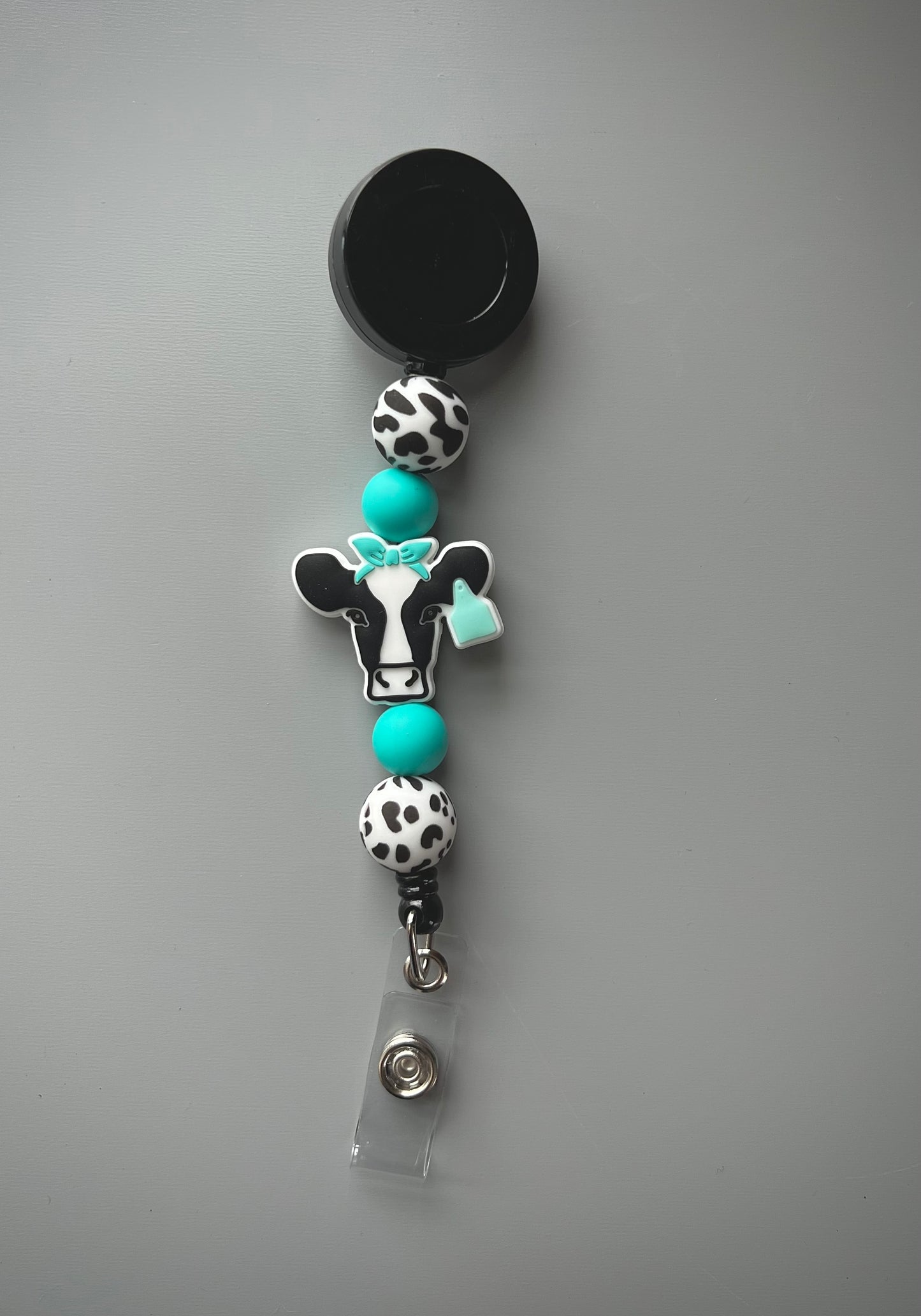 Black Cow Turquoise Tag Badge Reel