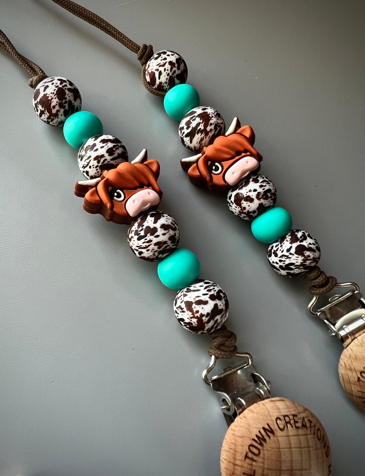 Brown Cow Print Turquoise Pacifier Holder