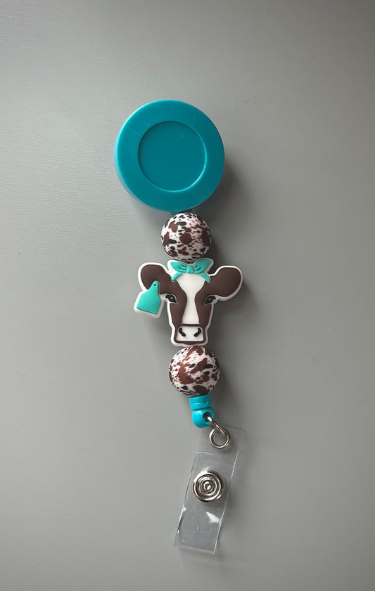 Brown Cow Turquoise Badge Reel