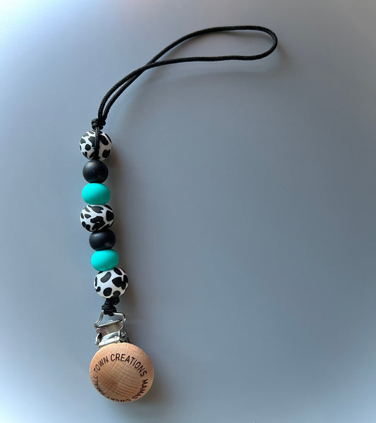 Turquoise Cow Print Pacifier Holder