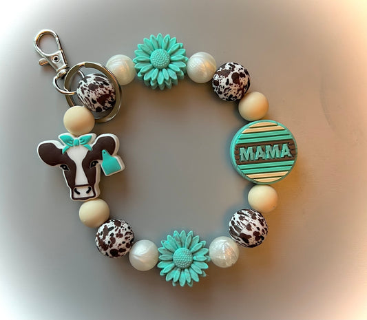 Turquoise Mama Cow Wristlet